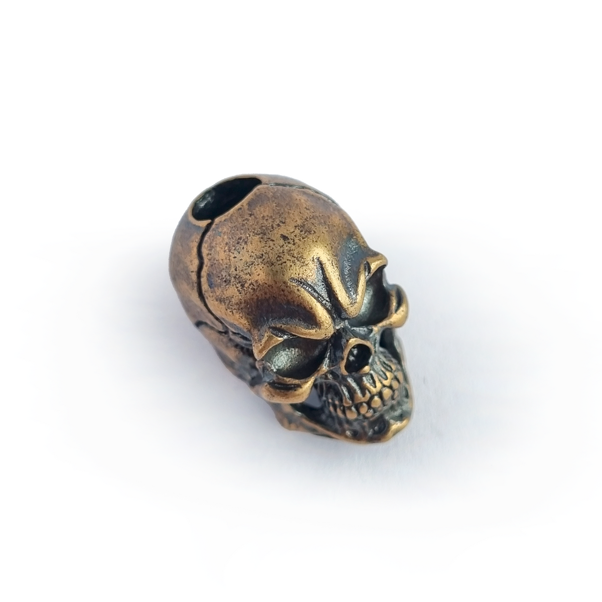 Pingente Bead Skull (caveira) fabricado em liga de bronze envelhecido. Ideal para paracord, lanyard.